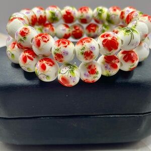 Asian Style Red and Green Ceramic Floral Bead Stretch Bracelet Set. 2 bracelets
